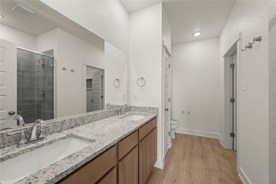 Please Note: These interior photos are not of the actual home but are of a completed one with a simialr floor plan. Finishes, features, and layouts may vary.