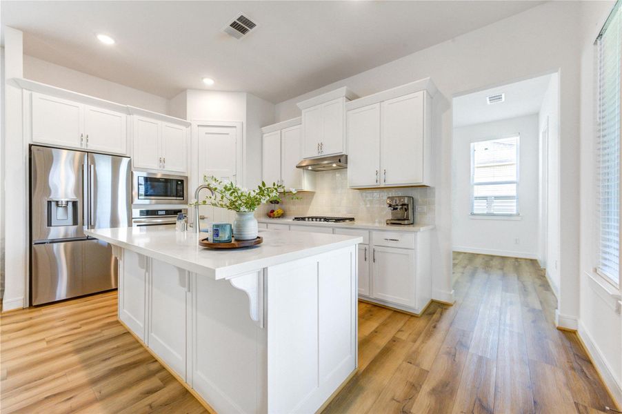 Furnished interior view inside a new home in Easthaven at Bridgeland Central, Cypress (Image 11).