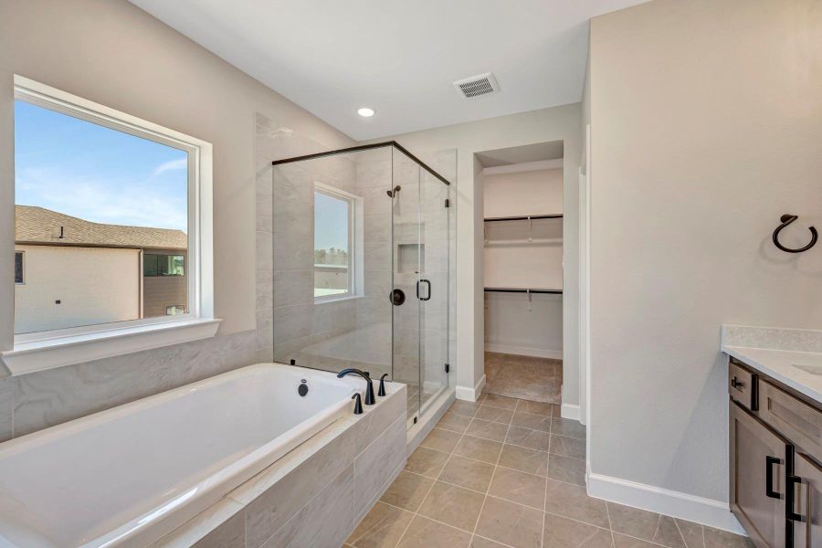 Furnished interior view inside a new home in COLTON - Reserve Collection, Todd Mission (Image 16).
