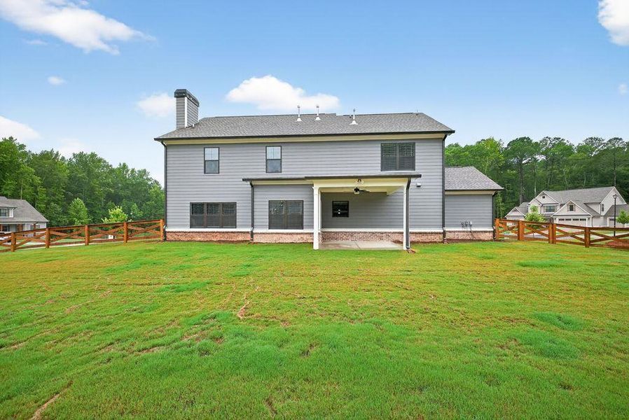Front exterior of a new home in Spring Creek, Monroe, GA, highlighting curb appeal (Image 24).