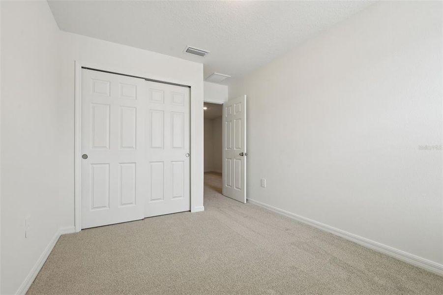 Spacious, unfurnished interior of a new home in Cagan Crossings West, Clermont (Image 32).