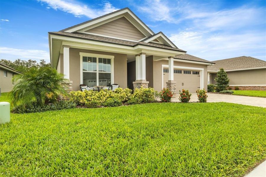 Front exterior of a new home in , Lakeland, FL, highlighting curb appeal (Image 26).