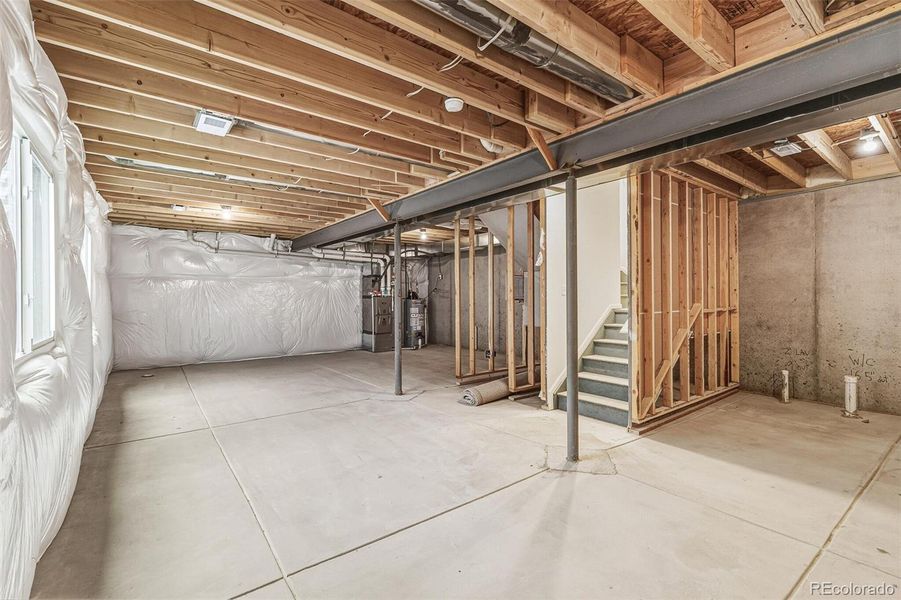 In-progress construction of a new home in Sky Ranch Villas, Watkins, CO (Image 34).