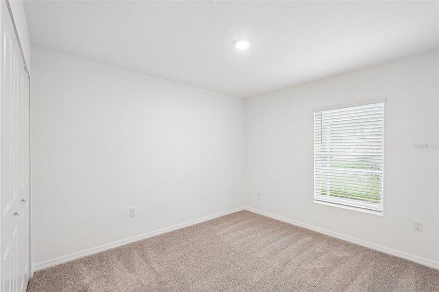Spacious, unfurnished interior of a new home in Port Charlotte, Port Charlotte (Image 35).