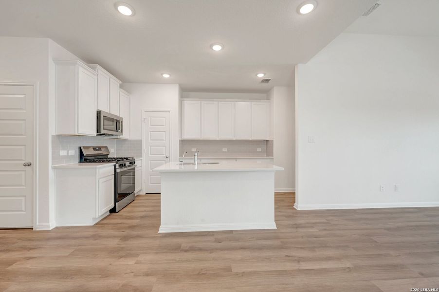 Furnished interior view inside a new home in Mesquite Ridge, San Antonio (Image 9).