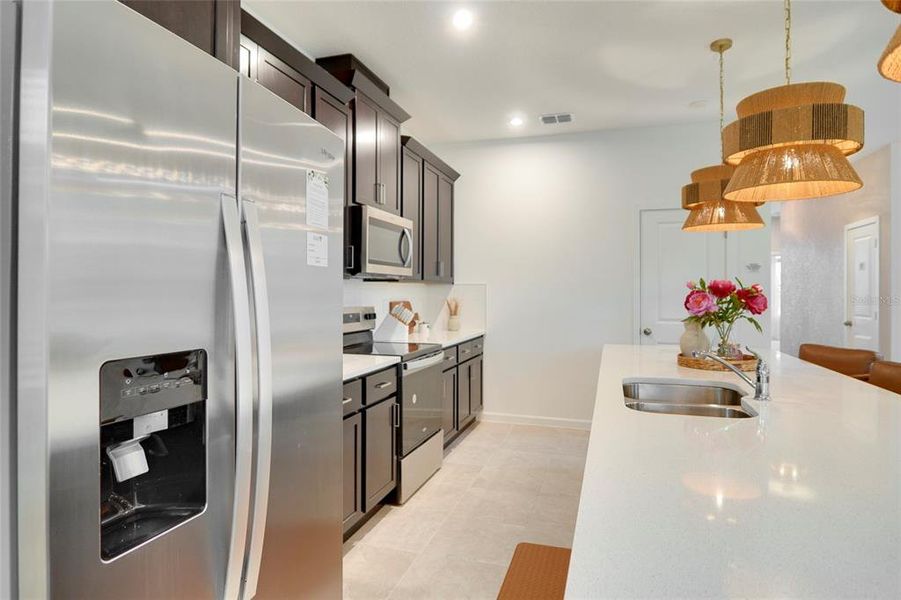 Furnished interior view inside a new home in Solara Resort, Kissimmee (Image 26).