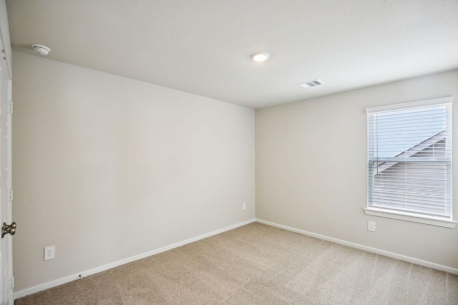 Spacious, unfurnished interior of a new home in Sanford Farms - Premier Series, Waller (Image 18).