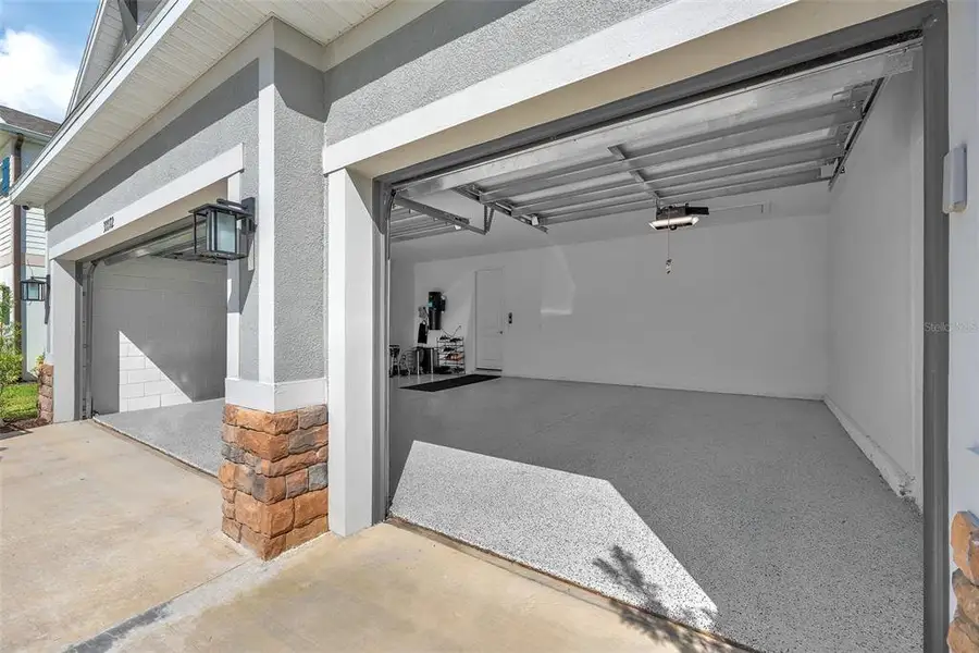 Exterior details and patio area of a home in , Wesley Chapel (Image 24).