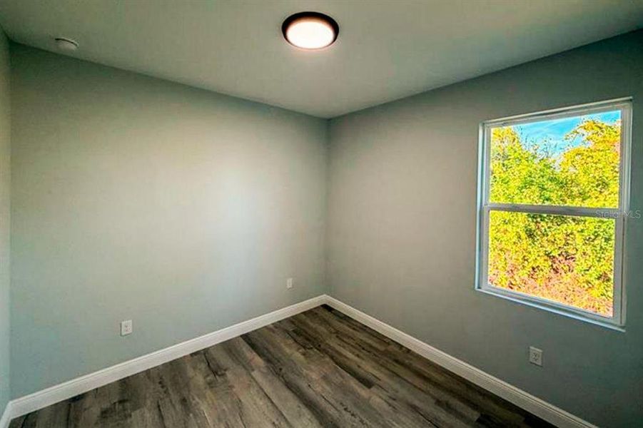 Spacious, unfurnished interior of a new home in , Port Charlotte (Image 5).