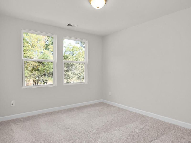 Spacious, unfurnished interior of a new home in Springvale, Fuquay Varina (Image 29).