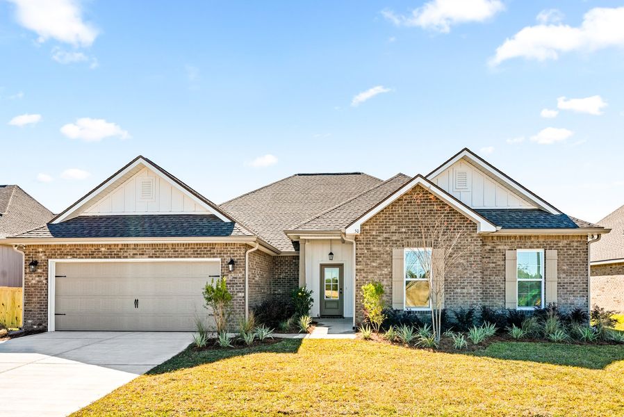 Front exterior of a new home in Natureview, Freeport, FL, highlighting curb appeal (Image 17).