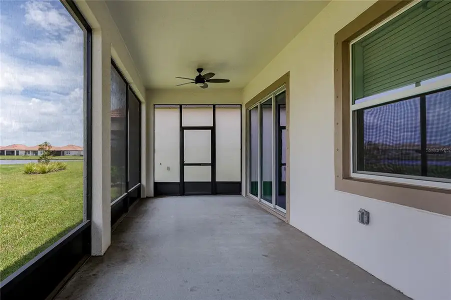 Exterior details and patio area of a home in Southshore Bay Active Adult, Wimauma (Image 23).