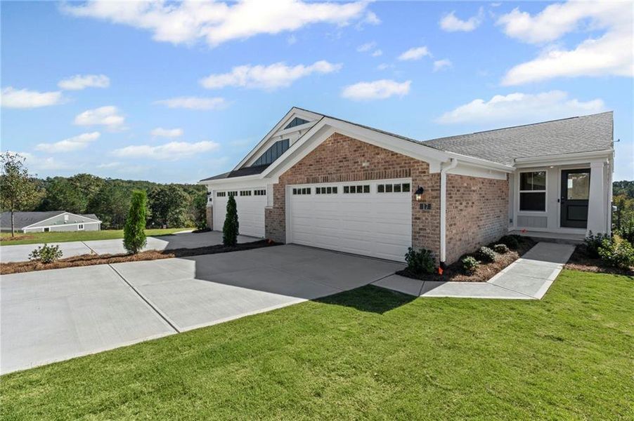 Front exterior of a new home in Villas at Gold Creek, Dawsonville, GA, highlighting curb appeal (Image 2).