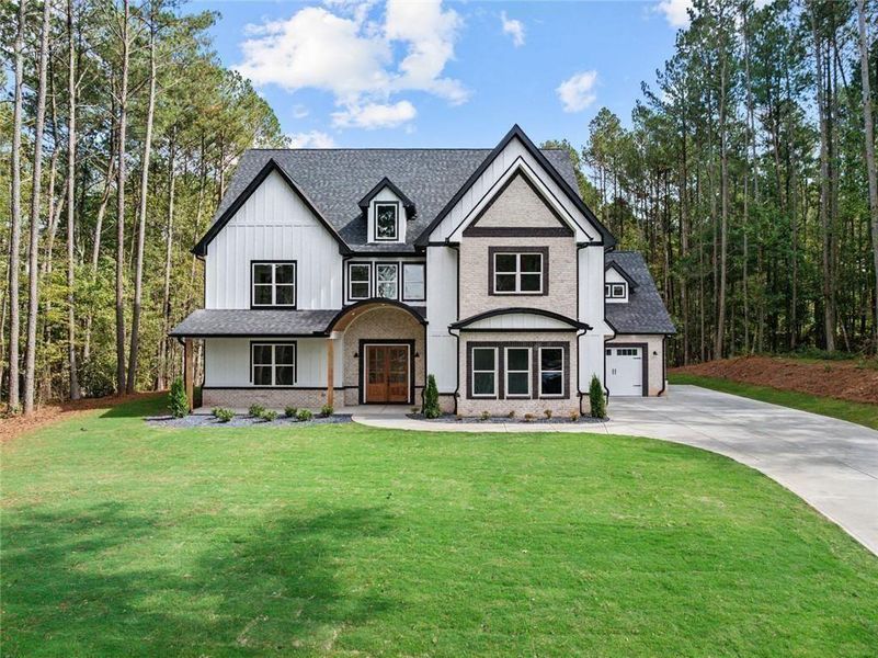 Front exterior of a new home in , Winder, GA, highlighting curb appeal (Image 36). Front exterior of a new home in , Winder, GA, highlighting curb appeal (Image 36).