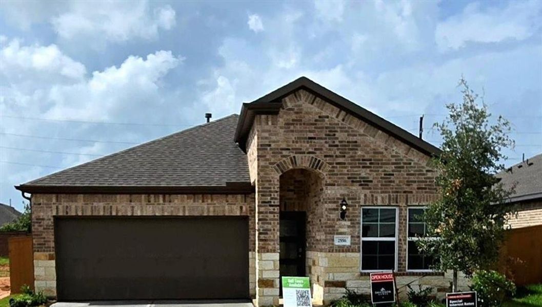 Front exterior of a new home in Sunterra, Katy, TX, highlighting curb appeal (Image 75). Front exterior of a new home in Sunterra, Katy, TX, highlighting curb appeal (Image 75).