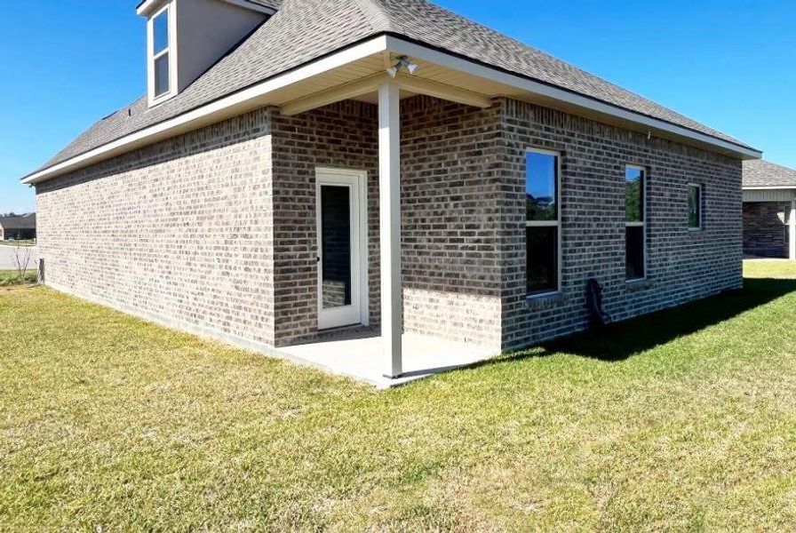 Exterior details and patio area of a home in Orange Gardens, Orange (Image 3).