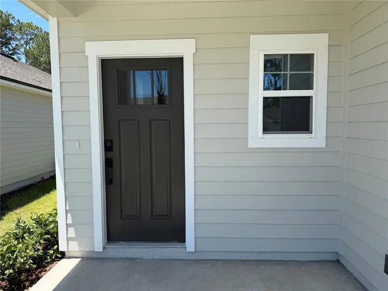 Exterior details and patio area of a home in Reserve East, Flagler Beach (Image 3).
