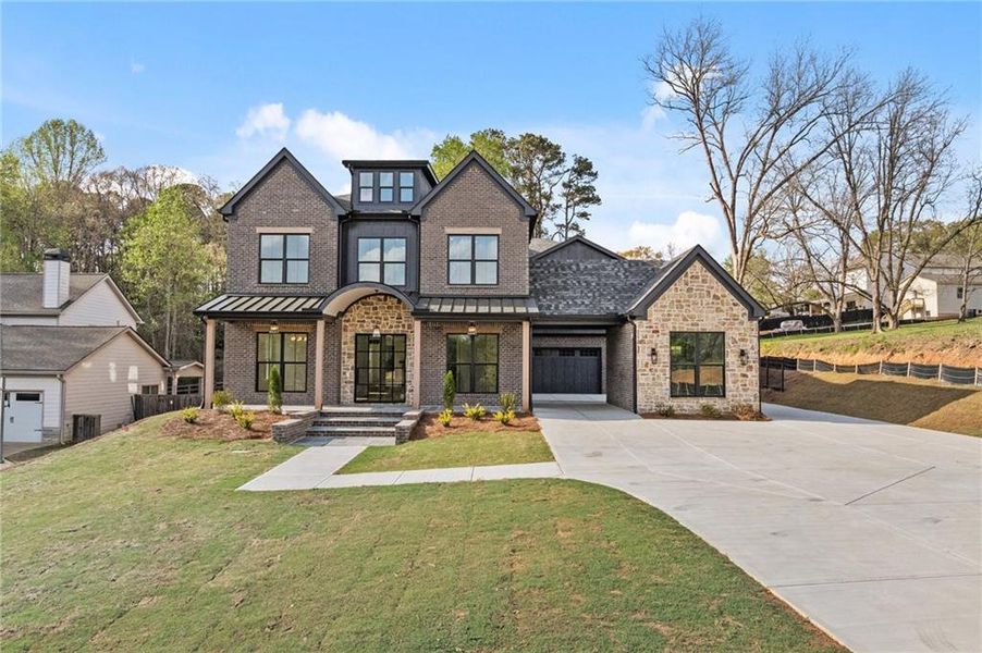 Front exterior of a new home in , Dacula, GA, highlighting curb appeal (Image 2). Front exterior of a new home in , Dacula, GA, highlighting curb appeal (Image 2).