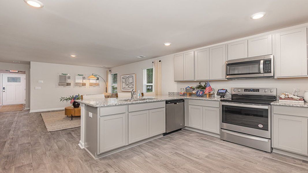 Furnished interior view inside a new home in Southshore Bay, Sunset Beach (Image 3).
