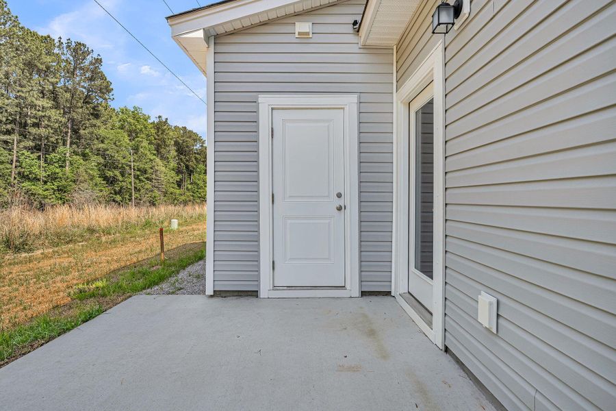 Exterior details and patio area of a home in Lakeview Commons, Goose Creek (Image 3).