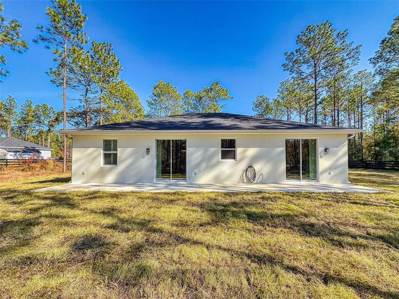Exterior details and patio area of a home in , Ocala (Image 3).