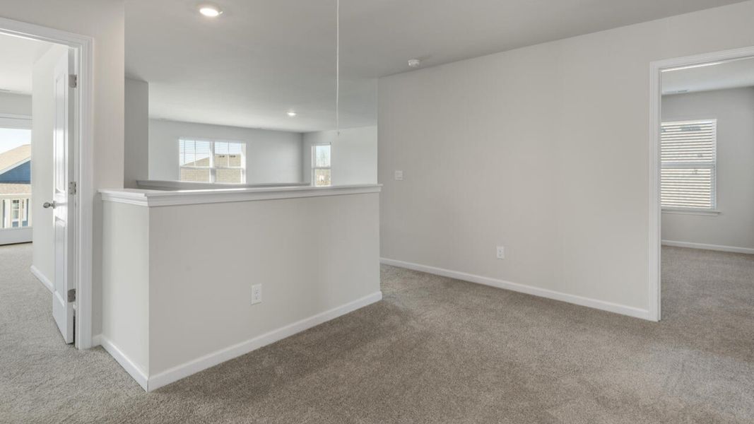 Spacious, unfurnished interior of a new home in The Preserve at Tidewater, Sneads Ferry (Image 26).