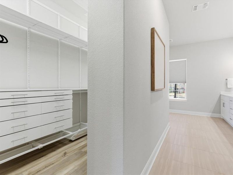 Custom Primary Walk-In Closet by Container Store