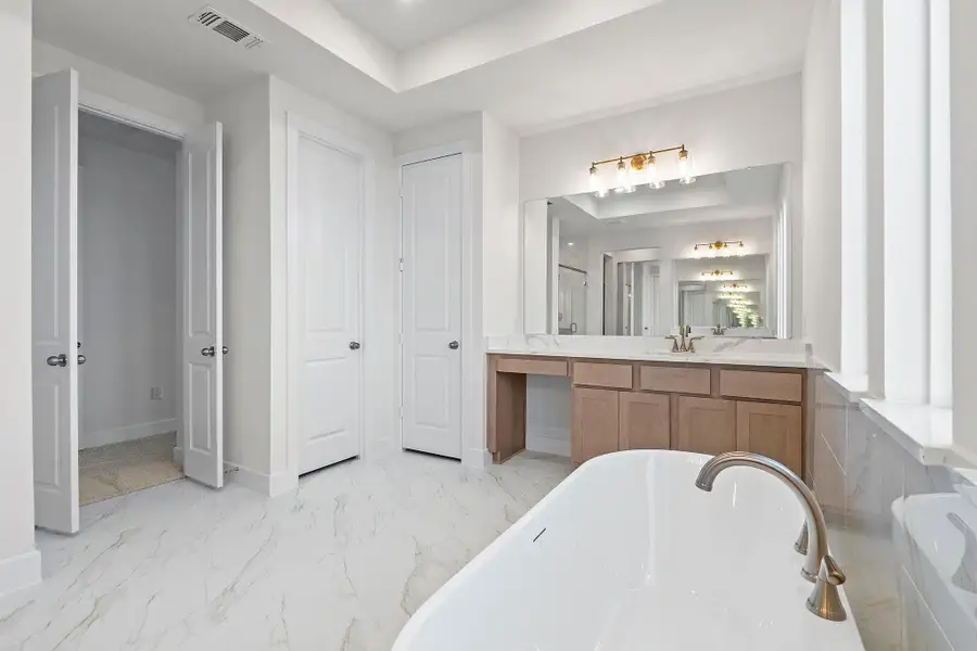 Furnished interior view inside a new home in Parmer Ranch, Georgetown (Image 9).