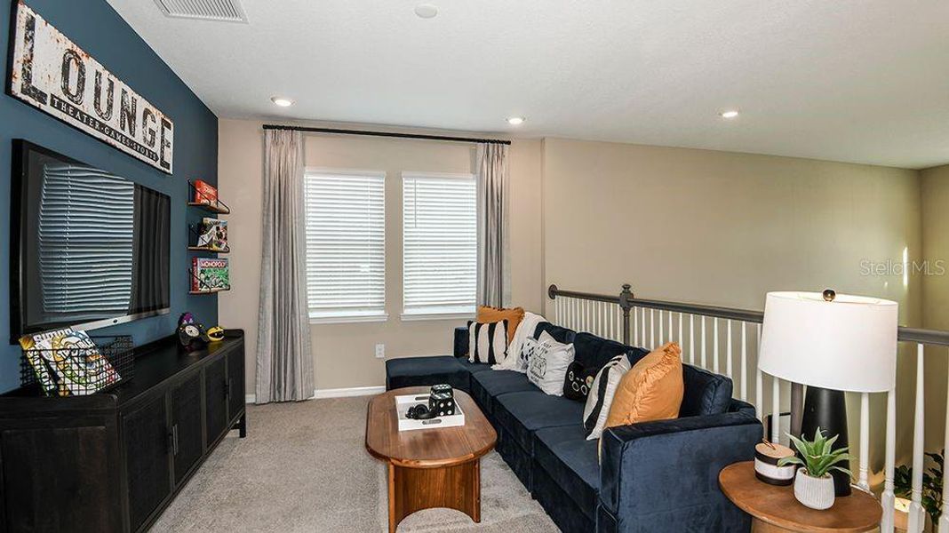 Furnished interior view inside a new home in Westview Community Group Page, Kissimmee (Image 6).