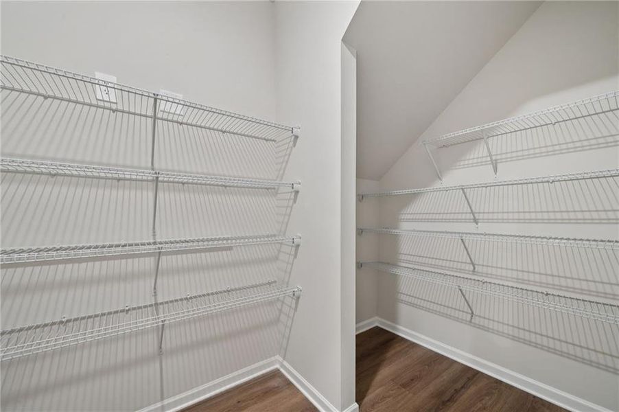 Furnished interior view inside a new home in Vines at Mill Creek - Estate Series, Braselton (Image 10).