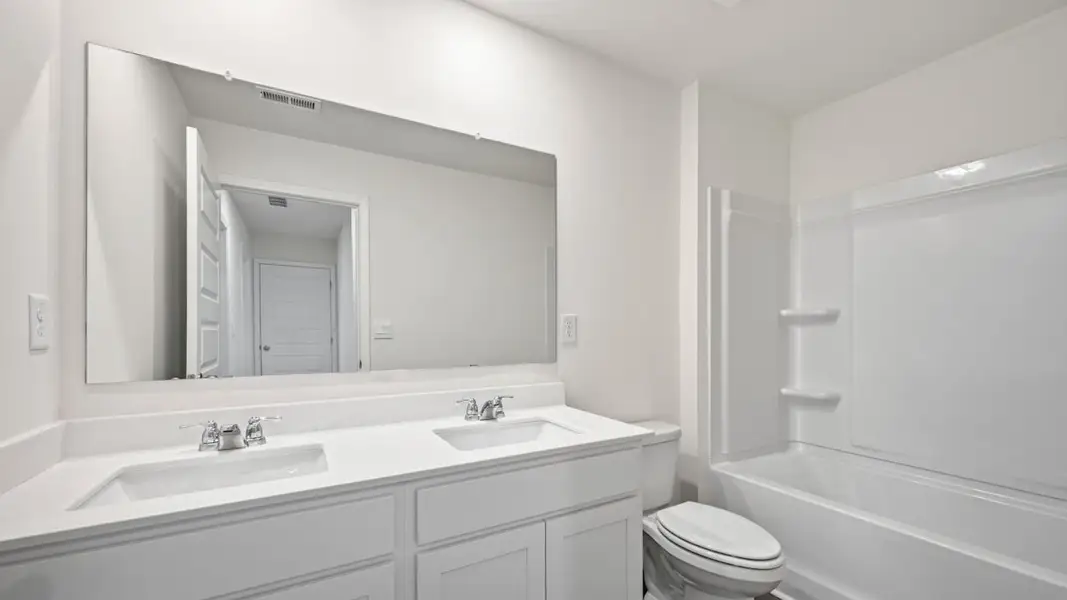 Representative furnished interior of a home built from the Sudbury by D.R. Horton in Echo Glen, Stockbridge (Image 8).