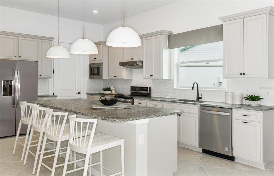 Furnished interior view inside a new home in Tohoqua Reserve, Kissimmee (Image 4).