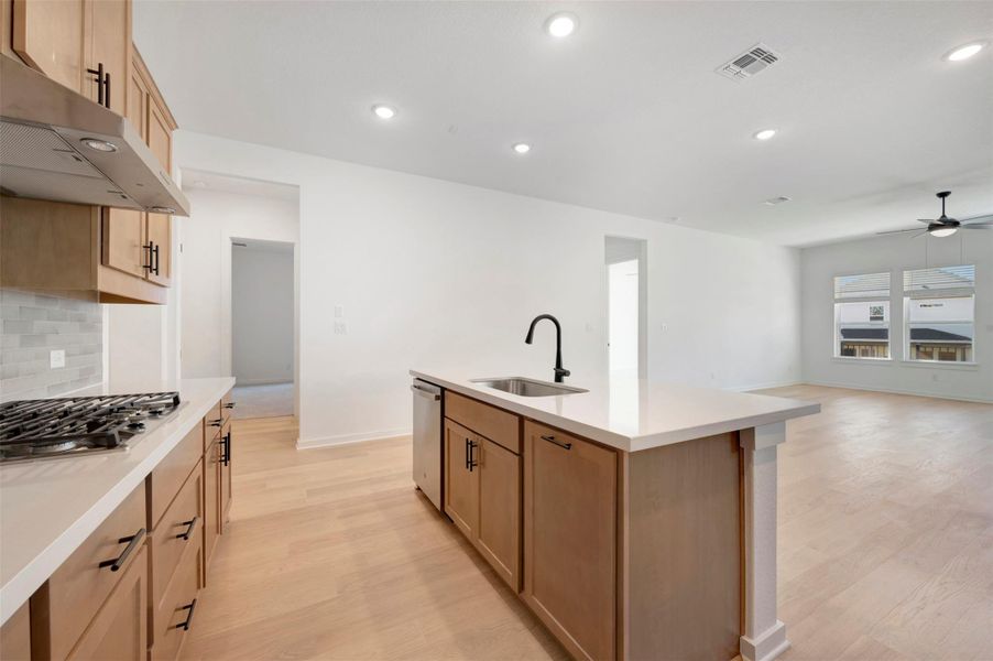 Furnished interior view inside a new home in Heritage, Dripping Springs (Image 6).
