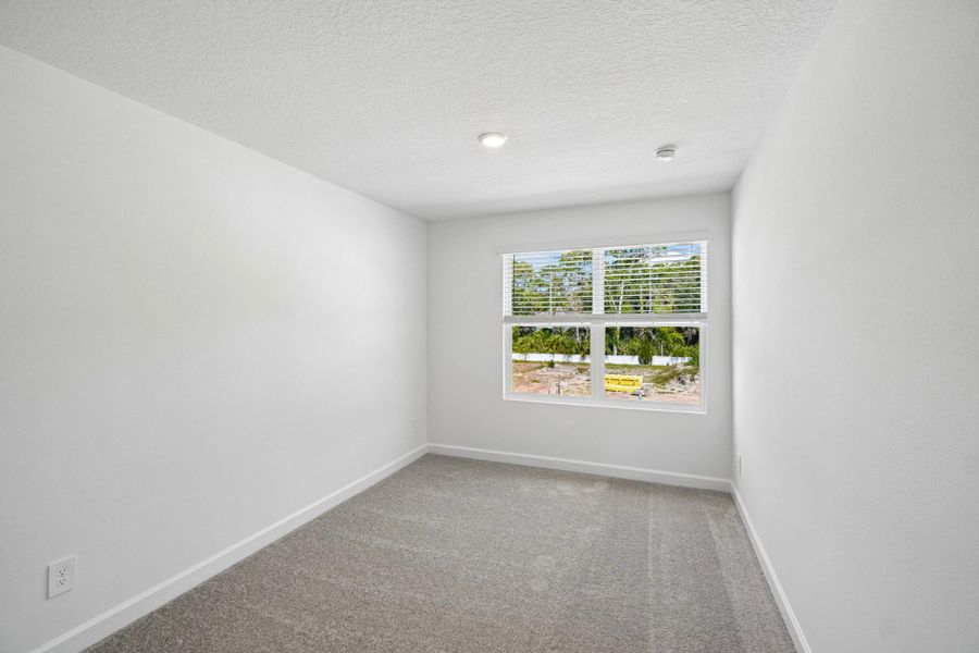 Bedroom 3 features a double window for extra light