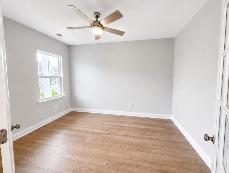 Spacious, unfurnished interior of a new home in Berkeley Mill, Cumming (Image 11).