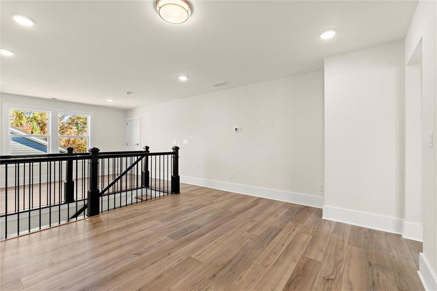 Spacious, unfurnished interior of a new home in Hillgrove Preserve, Powder Springs (Image 37).