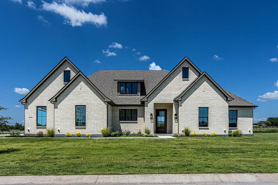 Front exterior of a new home in , Caddo Mills, TX, highlighting curb appeal (Image 21). Front exterior of a new home in , Caddo Mills, TX, highlighting curb appeal (Image 21).