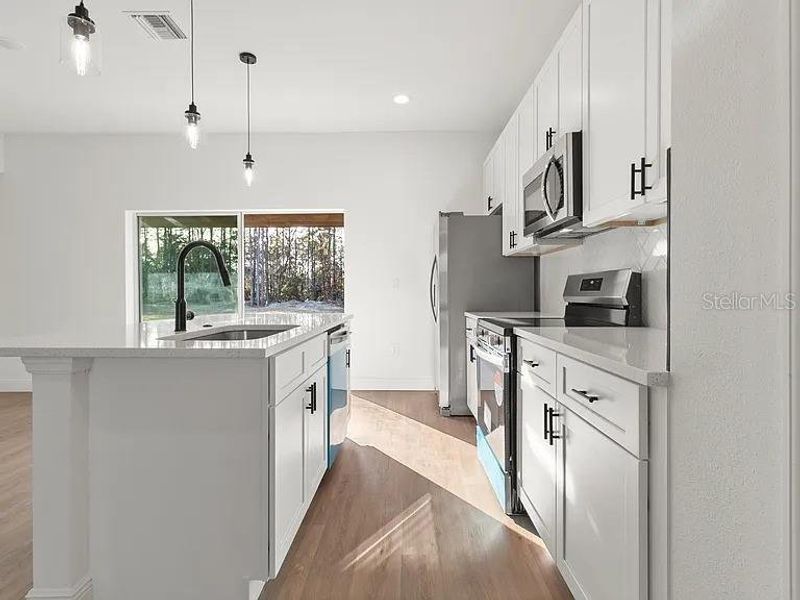 Furnished interior view inside a new home in , Ocala (Image 3).