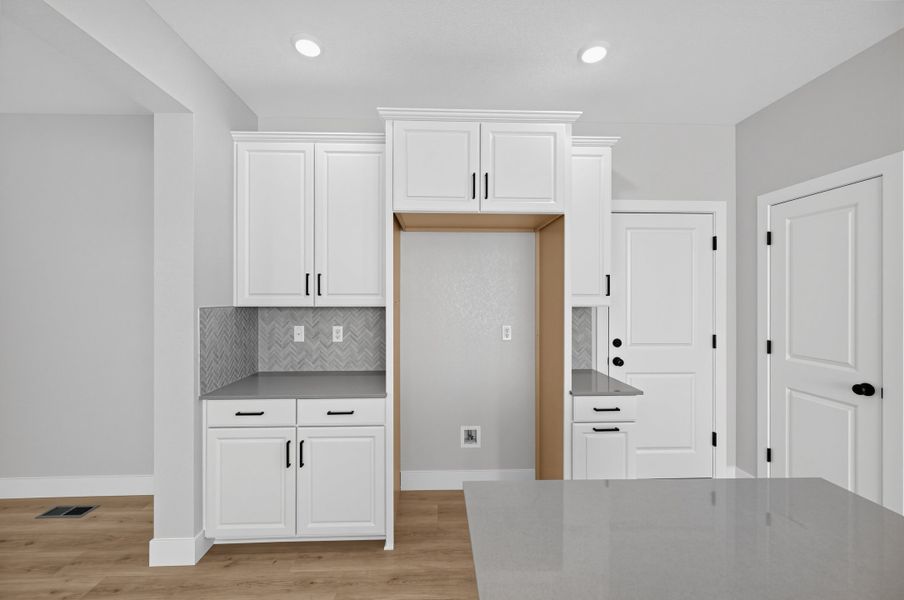 Furnished interior view inside a new home in Trailstone, Arvada (Image 5).