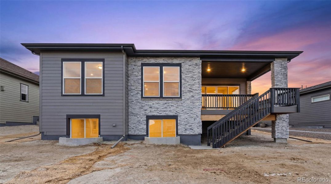 Exterior details and patio area of a home in Hilltop at Inspiration, Aurora (Image 22).