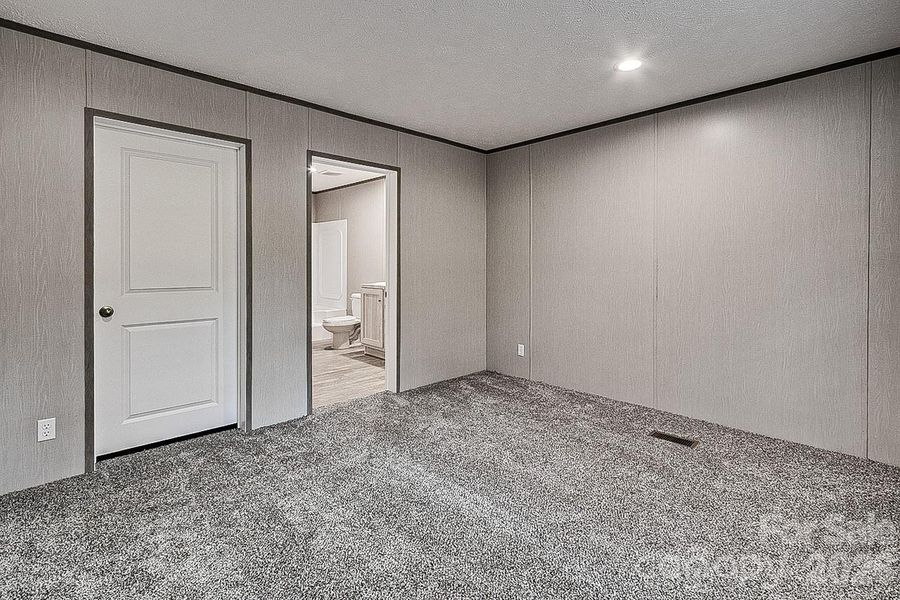 Primary bedroom with bath