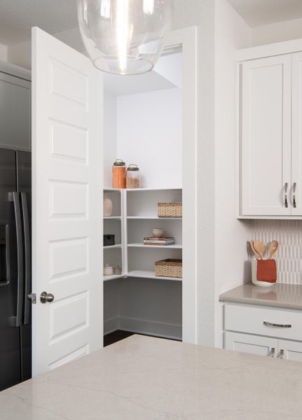 Representative furnished interior of a home built from the Bergamot by Tri Pointe Homes in Union Park, Little Elm (Image 7).