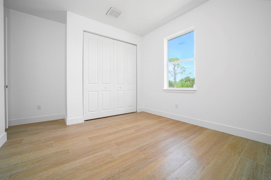 Spacious, unfurnished interior of a new home in , Port Charlotte (Image 22).