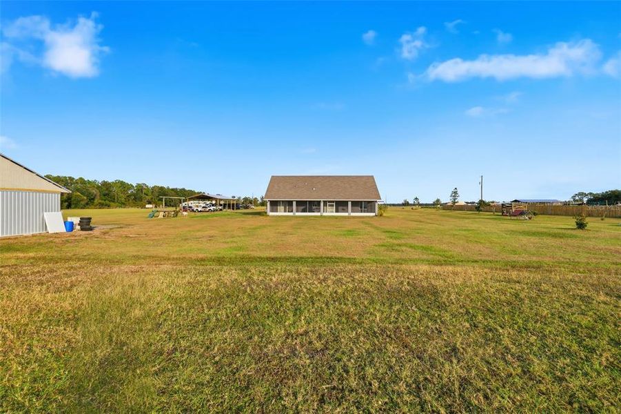Exterior details and patio area of a home in , Dade City (Image 38).