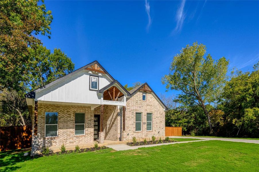 View of front of house with a front lawn