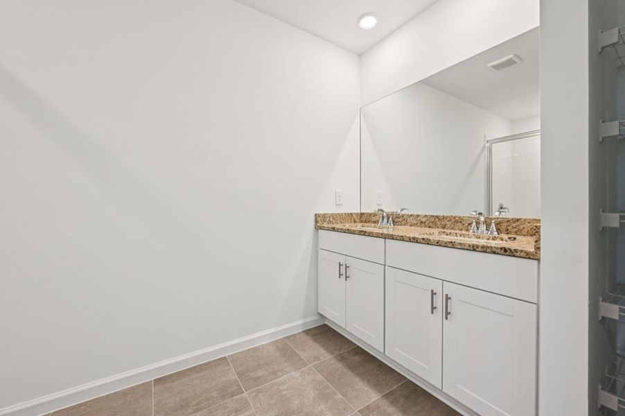 Furnished interior view inside a new home in Hampton Park - Classic Series, Vero Beach (Image 8). Furnished interior view inside a new home in Hampton Park - Classic Series, Vero Beach (Image 8).