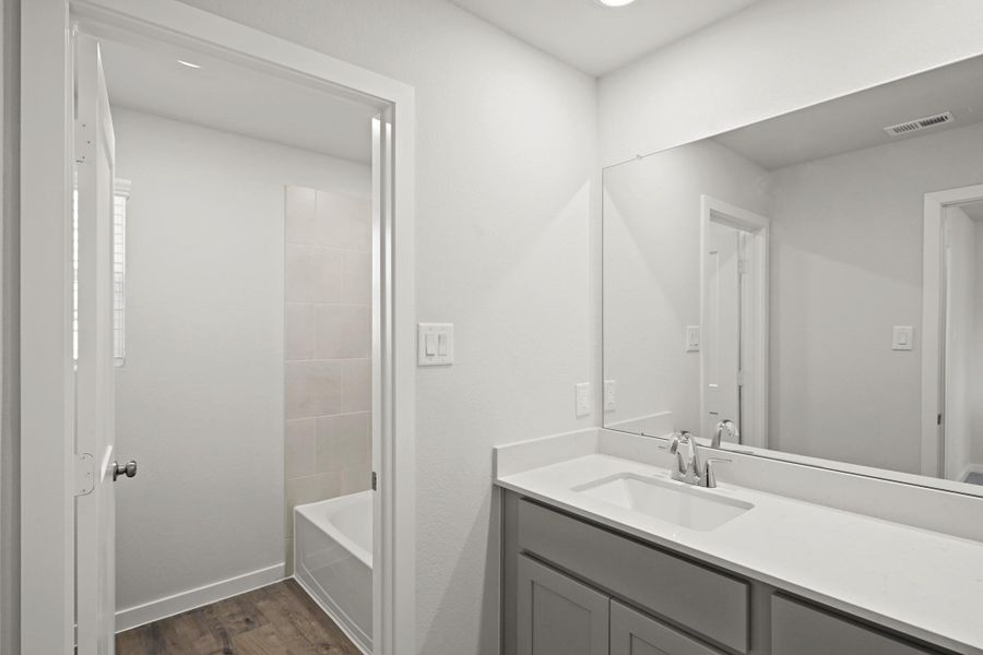 Furnished interior view inside a new home in Lakes at Black Oak, Magnolia (Image 5).