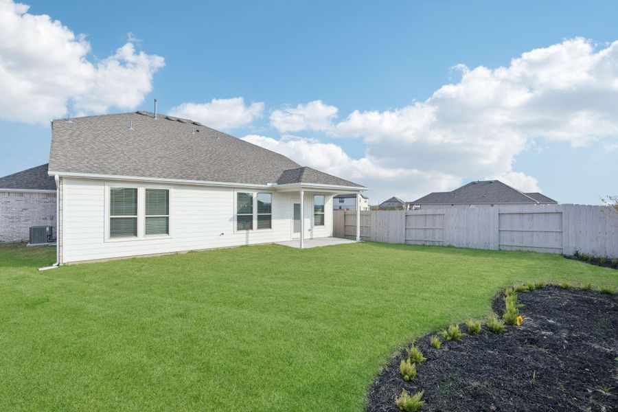 Exterior details and patio area of a home in River Ranch, Dayton (Image 3).