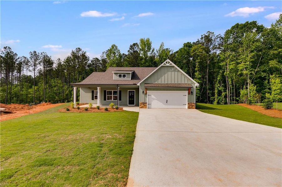 Front exterior of a new home in , Winston, GA, highlighting curb appeal (Image 2). Front exterior of a new home in , Winston, GA, highlighting curb appeal (Image 2).