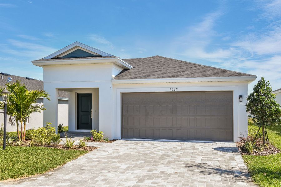 Representative exterior photo of a completed home built from the Bismark by Casa Fresca Homes in Cherrywood Preserve, Ocala, FL (Image 4).